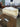 03289 Cream Upholstered Sofa with Elegant Curved Back