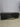 39408 Sleek Black TV Stand with Glass Door