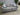 03975 Modern Gray Upholstered Sofa with Patterned Cushions