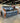 43660 Black Leather Loveseat with Wooden Arms