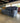 95402 Charcoal Gray Reclining Sofa with Built-in Console
