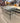 88597 Glass Top Metal Coffee Table with Decorative Shelf