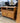 87755 Vintage Oak Finish TV Stand