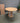 96377 Round Expandable Dining Table with Light Wood Finish