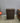 04243 Dark Wood Three-Drawer Nightstand