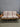 02359 Vintage Wooden Futon with Patterned Cushion
