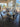 63064 Elegant Glass Top Dining Set with Ornate Metal Chairs