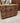 27037 Elegant Dark Wood Kitchen Cabinet with Bronze Handles