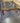 07717 Rustic Glass-Top Coffee Table with Carved Wood Legs