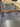 07717 Rustic Glass-Top Coffee Table with Carved Wood Legs