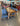 96101 Rustic Wooden Dining Table with Blue Upholstered Chairs