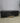 39408 Sleek Black TV Stand with Glass Door
