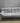 62487 Gray Tufted Convertible Sofa