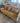 10521 Elegant Tan Upholstered Sofa with Paisley Cushions