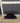 62971 Black Three-Tier TV Stand with Open Shelving