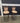 80404 Set of Two Bronze Metal Bar Stools with Tan Suede Cushions