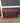 59951 Vintage Red Console Table with Four Drawers