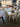 94610 Modern Glass-Top Dining Table Set with Upholstered Chairs