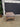 61593 Vintage Upholstered Ottoman with Carved Wooden Legs