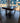 28409 Dark Wood Dining Table with Rivet Detailing