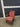 31936 Vintage Wooden Armchair with Red Paisley Cushions