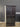 39045 Vintage Black Wood Cabinet with Double Doors