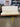 46066 Contemporary Cream Futon Sofa with Wooden Frame