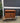 70258 Wooden Two-Door Cabinet with Open Shelf