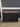 48796 Rustic Black Wood Cabinet with Geometric Design