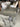 67122 Contemporary Gray Dining Set with Cushioned Chairs