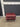67920 Vintage Red Leather Ottoman