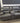 54392 Contemporary Gray Leather Electric Reclining Sofa with Console