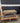 55756 Rustic Wood Coffee Table with Storage Shelf