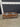 21375 Wood and Glass Coffee Table with Rattan Shelf