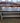 81915 Black Upholstered Examination Table with Storage Shelf