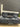 95402 Charcoal Gray Reclining Sofa with Built-in Console