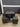 31938 Compact Square Dining Set with Black Cushions