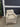 21677 Beige Upholstered Armchair with Skirted Base