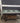 38468 Vintage Patio Glass Table with Storage Shelf