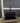 22078 Black Glass TV Stand with Silver Frame