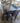 93055 Dark Wood Dining Set with Black Faux Leather Seats