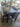 93055 Dark Wood Dining Set with Black Faux Leather Seats
