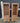 94225 Pair of Rustic Wooden Display Cabinets