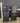 31854 Sleek Black Glass Display Cabinet with Dual Drawers