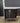 55754 Vintage Black Glass Pane Cabinet