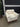 64349 Elegant White Armchair with Rattan Base