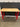 41259 Adjustable Height Workbench with Red Legs and Wood Top