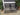 65523 Pair of Gray Wicker Patio Chairs