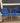 45755 Vintage White Metal Outdoor Bench with Blue Cushions