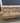 31285 Tan Upholstered Reclining Sofa